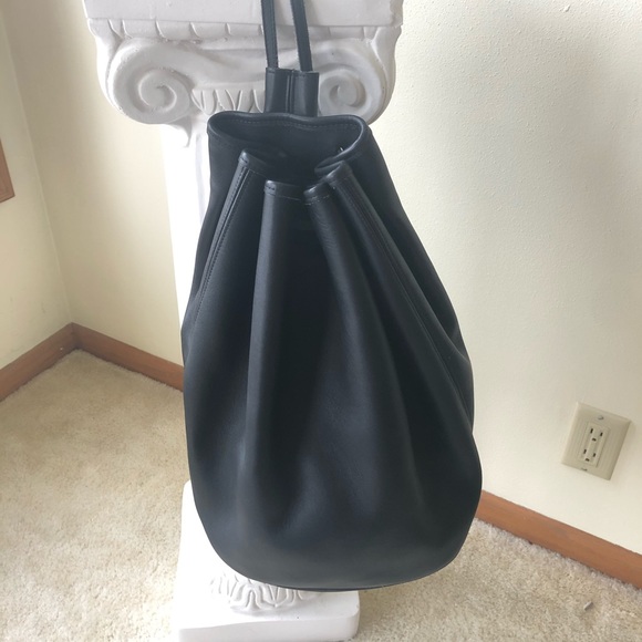 Coach Handbags - COACH vintage The sling Black Leather RuckSack